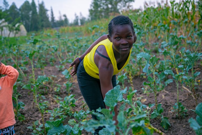 youth-empowerment-girl-harvesting-kales