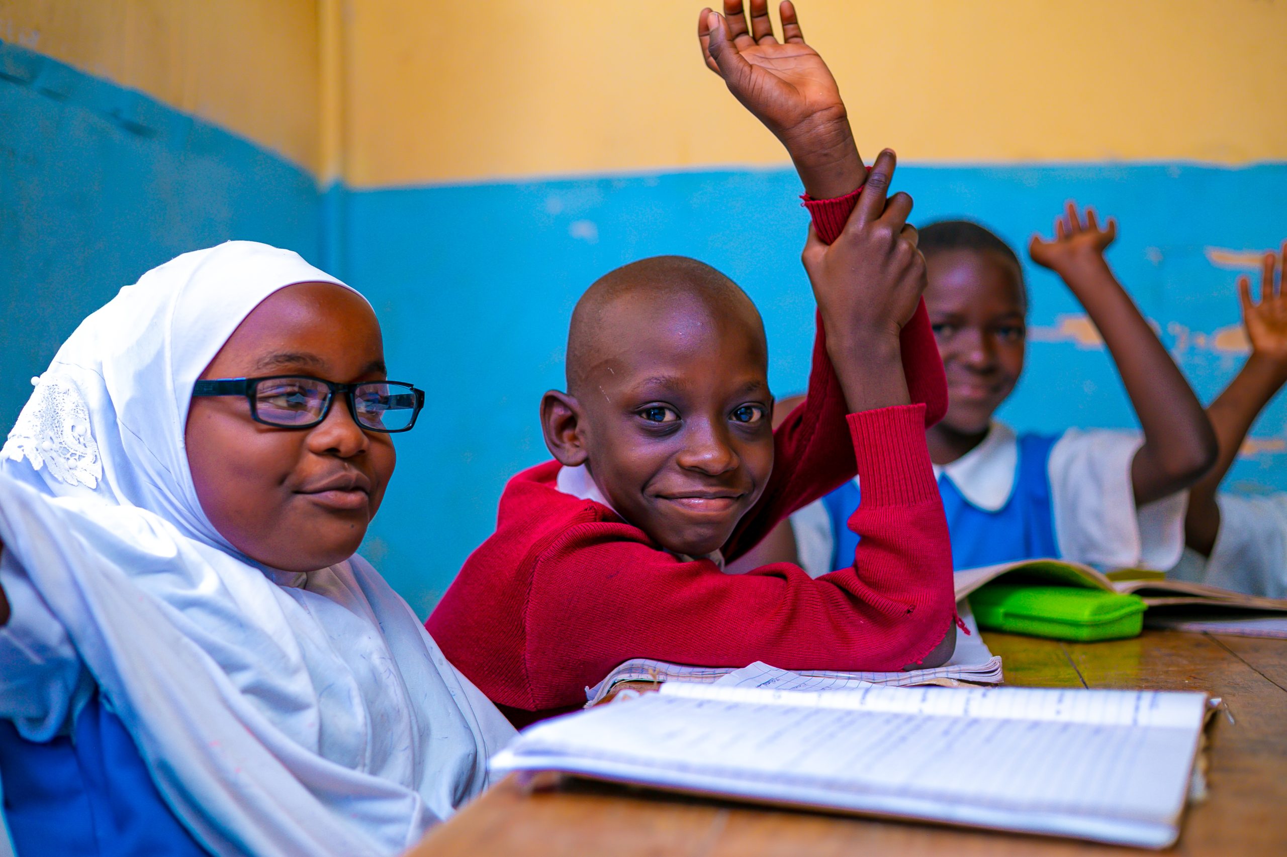 three-children-participating -in-class